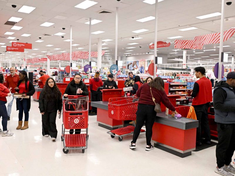 Target steps up investment in store staffing, cuts about 500 other roles